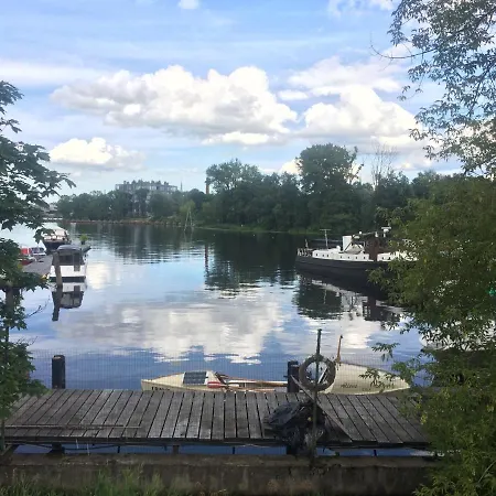 Triada Near The Park And River Daugava
